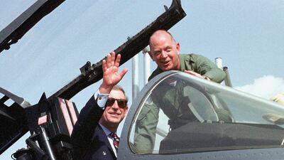 Prince Charles waves from the cockpit of a Eurofighter jet at the Dubai Air Show in November 1999. AFP