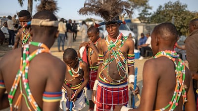 Performers gather before a Bapedi Dinaka dance performance at a family gathering for a lobola (bride price) ceremony in Polokwane, South Africa. AFP