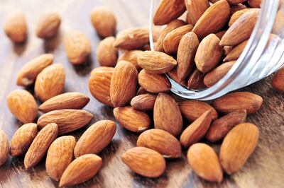 Raw nuts such as almonds can keep you feeling satisfied, while the mineral and essential fatty acid content boosts metabolism. Photo: iStockphoto
