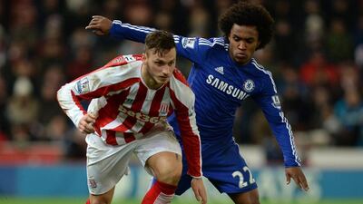 Stoke City’s Marko Arnautovic (L) in action against Chelsea’s Willian during the English Premier League soccer match between Stoke City and Chelsea at the Britannia Stadium in Stoke, Britain, 22 December 2014. EPA/NIGEL RODDIS