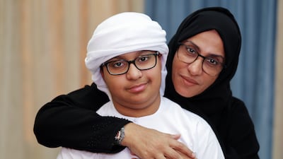 Mariam Kouraichi and her 13-year-old son Zayed. Photo: Chris Whiteoak / The National