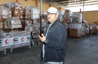 Fadel Al Shamsi shows the warehouse in Egypt's Al Arish where the medical aid is stored. Pawan Singh / The National