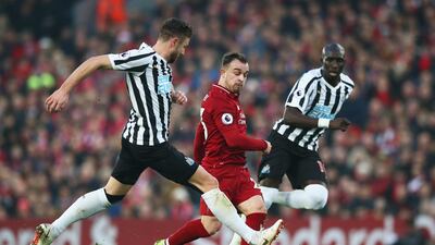 Shaqiri of Liverpool takes on Paul Dummett and Mohamed Diame of Newcastle United. Getty Images