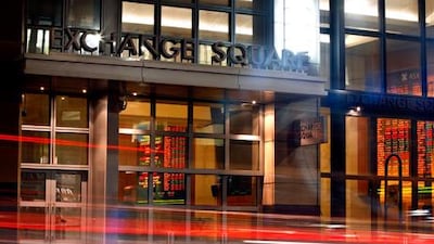 Traffic streams past the Australian Securities Exchange (ASX), the target of a takeover by the Singapore Exchange. Photographer: Grant Turner/Bloomberg News