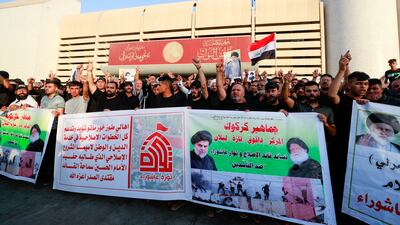Supporters of Shiite cleric Moqtada Al Sadr protest outside Iraq's Parliament in Baghdad on Thursday. AFP
