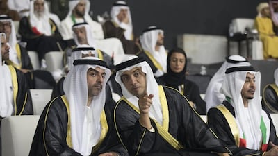Sheikh Hamed bin Zayed, Chairman of the Crown Prince Court of Abu Dhabi and Abu Dhabi Executive Council Member, left, Sheikh Mansour bin Zayed, Deputy Prime Minister and Minister of Presidential Affairs, second left, and Sheikh Issa bin Zayed, right, attend the 45th UAE National Day celebrations. Mohamed Al Hammadi / Crown Prince Court — Abu Dhabi