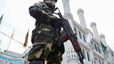 Sri Lankan security personnel guard a mosque in Colombo during Friday prayers on May 17, 2019, following anti-Muslim riots in parts of the country earlier in the week. AFP