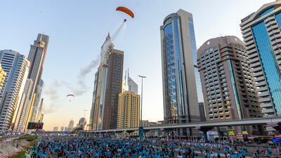 Paragliders flew over participants adding excitement