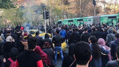 A wave of spontaneous protests over Iran's weak economy swept into Tehran on Saturday, with college students and others chanting against the government. AP