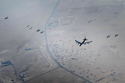 The US military said on Monday it flew a pair of nuclear-capable B-52 long-distance bombers over the Middle East in a show of force. US Air Force/AP
