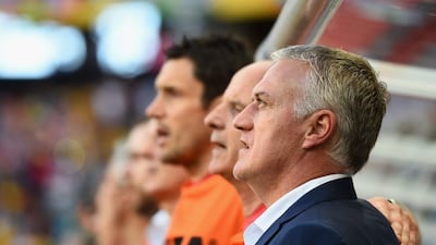 Didier Deschamps looks on during the national anthem prior to France's match against Switzerland on Friday at the 2014 World Cup in Salvador, Brazil. Christopher Lee / Getty Images / June 20, 2014