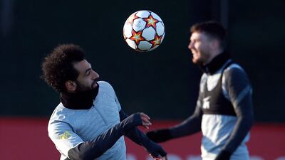 Liverpool's Mohamed Salah heads the ball. Reuters