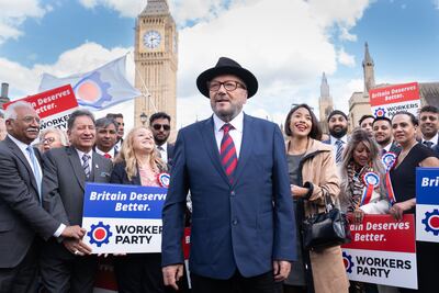 George Galloway with Workers Party candidates outside parliament. PA