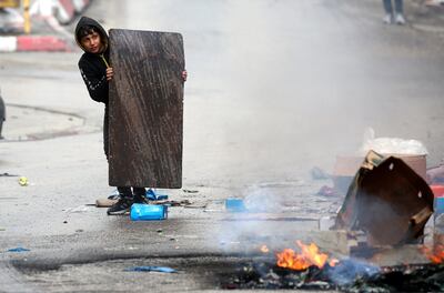 A moment from a protest marking the 28th anniversary of the Cave of the Patriarchs massacre, in Hebron, last year. Baruch Goldstein, a member of the far-right Israeli movement, killed 29 people in a shooting spree at Al Ibrahimi Mosque in Hebron in 1994. EPA