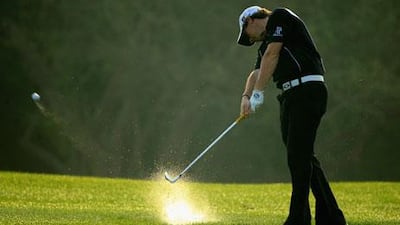 Rory McIlroy in action during the first round of the Omega Dubai Desert Classic at the Emirates Golf Club yesterday.