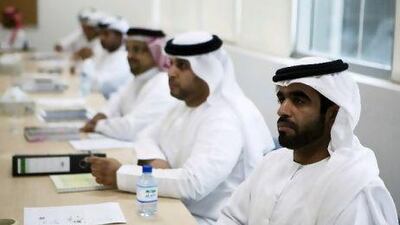 Students listen in an Introduction to Civil Security class at Khalifa University, part of the new master's programme in security. Andrew Henderson / The National