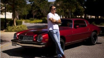 Faruk Bhagani, of Dubai, loves his 1976 Chevrolet Camaro, but it's another classic muscle car that is his ultimate dream drive. Christopher Pike / The National