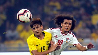 UAE playmaker Omar Abdulrahman, right, made his first competitive outing in 10 months. AP