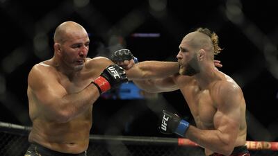Glover Teixeira throws a punch at Jiri Prochazka during their light heavyweight title fight. AFP
