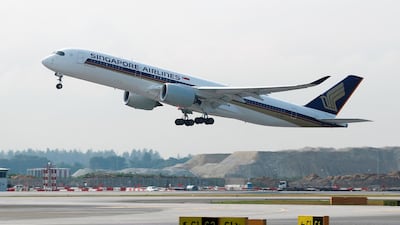A Singapore Airlines Airbus A350-900 plane takes off at Changi Airport in Singapore. Edgar Su / Reuters