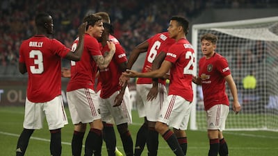 Manchester United players celebrate Mason Greenwood's strike. Getty