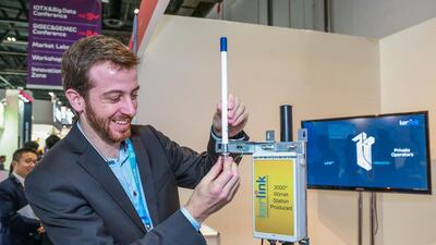 Above, at the Kerlink Wirnet Station with a detachable rubber ducky antenna display. Victor Besa for The National