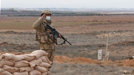 Jordanian soldiers patrol along the border with Syria to prevent trafficking. AFP