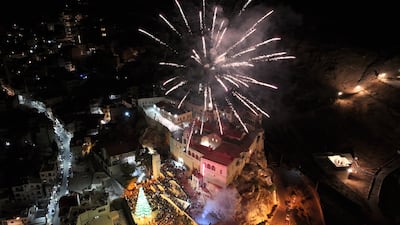 Fireworks explode over Sednaya Convent on the outskirts of Damascus. AP