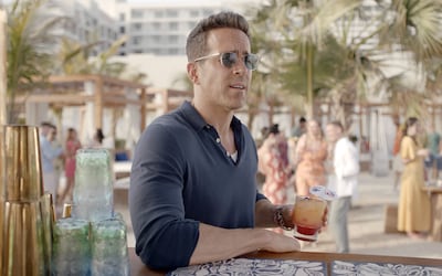 Ryan Reynolds enjoys a drink at Cafe Del Mar on Yas Bay. Photo: Yas Island / Miral