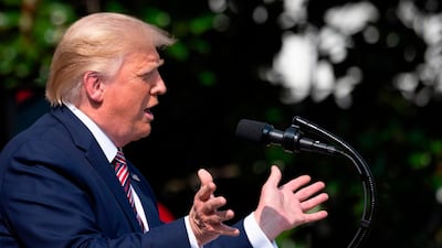 US President Donald Trump delivers remarks on Rolling Back Regulations to Help All Americans on the South Lawn at the White House on July 16, 2020 in Washington,DC. / AFP / JIM WATSON