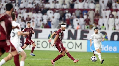 Al Wahda's Dusan Tadic scores his second goal in a 3-1 win over Qatar's Al Sadd during the AFC Champions League match at Al Nahyan, Abu Dhabi. All photos: Chris Whiteoak / The National
