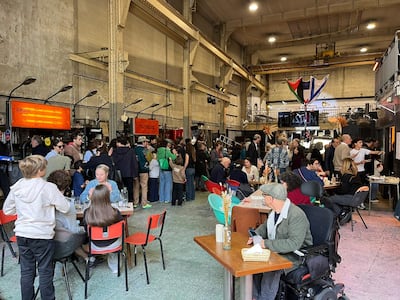 Patrons eat at the restaurant Sababa, the Taste of Peace during its opening in Paris, on Saturday. AFP