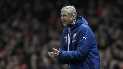 Arsenal’s manager Arsene Wenger urges on his side during their 1-0 win against Southampton last Wednesday. Ian Kington / AFP / December 3, 2014