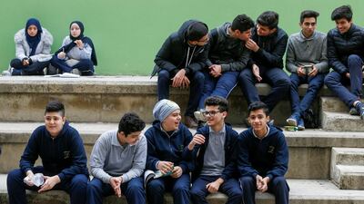 Students sit together during recess at a public school in Beirut, Lebanon December 12, 2019. Reuters