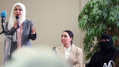 From left, candidate and former MP Jenan Boushehri speaks alongside Anoud Al Enezi and Fahima Al Rashedi. AFP