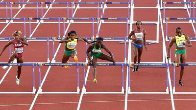 Tobi Amusan on her way to victory in the women's 100m hurdles final at the World Athletics Championships. EPA