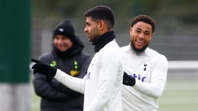 Tottenham Hotspur's Cristian Romero, centre, and Arnaut Danjuma during training. Reuters