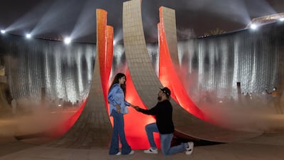 Junaid Mohammed proposes to Hiba Zubair at the Water Feature. Photo: Expo 2020 Dubai