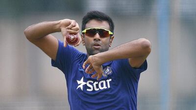 India cricketer Ravichandran Ashwin bowls during a training session at National Cricket Academy in Bangalore, India, Friday, July 1, 2016. Aijaz Rahi / AP Photo