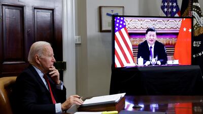 Mr Biden speaks virtually with Mr Jinping from the White House in Washington in November 2021. Reuters