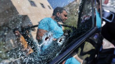 The bullet-ridden car in which a Palestinian was shot dead by Israeli forces in the West Bank on Friday. AFP