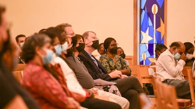 Worshippers during Easter Sunday Mass at St Andrew's, Abu Dhabi. Khushnum Bhandari / The National