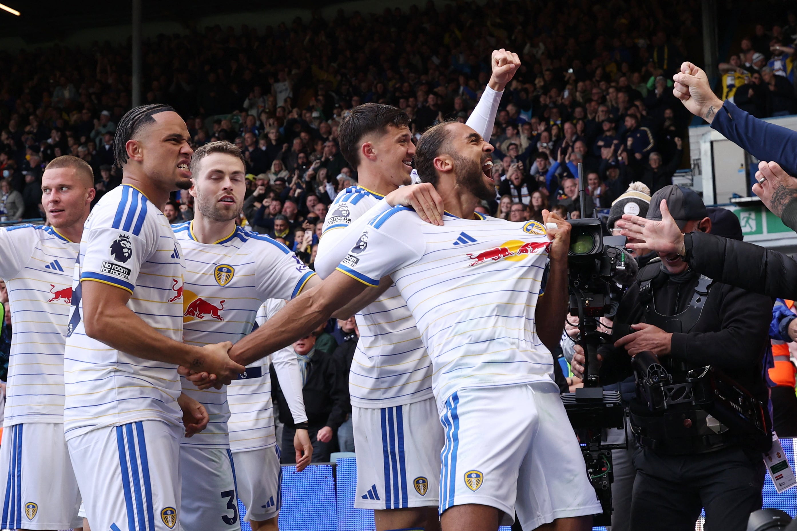 Leeds United's Dominic Calvert-Lewin celebrates with teammates after scoring to make it 1-1. Reuters