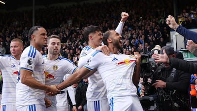Leeds United's Dominic Calvert-Lewin celebrates with teammates after scoring to make it 1-1. Reuters