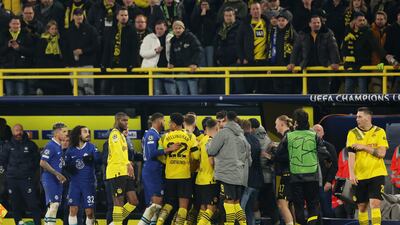 Players from both teams clash. Reuters