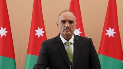 A handout picture released by the Jordanian Royal Palace on October 12, 2020, shows Bisher al-Khasawneh being sworn in as the new Prime Minister of Jordan, in the capital Amman. AFP