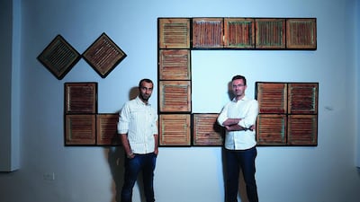 Left to right, the Emirati designer Khalid Shafar and Giuseppe Moscatello, the manager of the Maraya Art Centre in Sharjah, who are the co-curators of the Islamopolitan exhibition. The pair see it as 'a differenet kind of Islamic exhibition'. Sarah Dea / The National