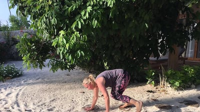 The training involves taking on several animal poses, such as bear crawls. Rosemary Behan