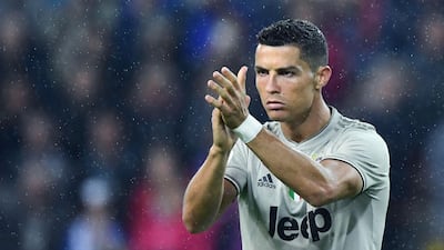 Both Cristiano Ronaldo and his son have been on the goal trail. AFP