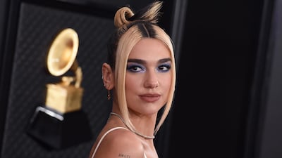 Female British stars Dua Lipa (pictured), Arlo Parks and Celeste lead the competition for the Brit Awards with a trio of nominations apiece for the UK music prizes. AP Photo